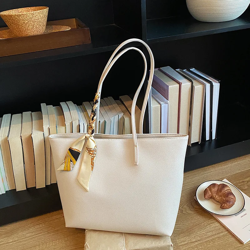 

Cross-border large-capacity bag women's 2026 summer new versatile fashion single shoulder trend commuting retro casual tote bag