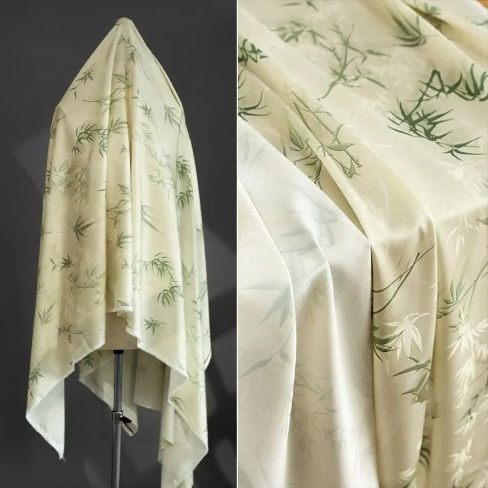 

Green bamboo leaf print fabric with plant patterns for traditional Chinese-style cheongsam, Hanfu, and creative clothing design