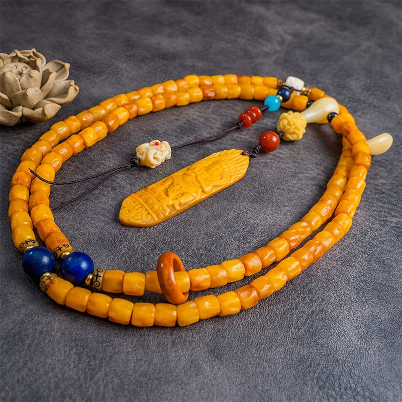 art bracelet featuring a passion fruit seed design made from camel and cow bone with an aged finish suitable as an