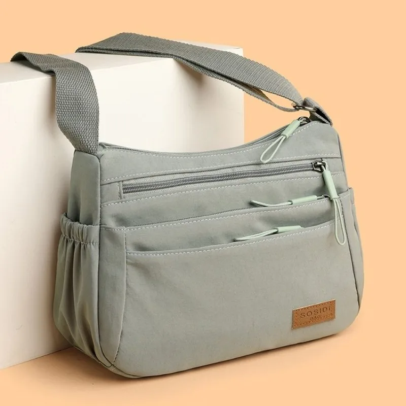

Elegant Textured Leather Handbag For Women Luxury Designer Crossbody Large Capacity Diaper Bag For Commuter Simple Chic Tote