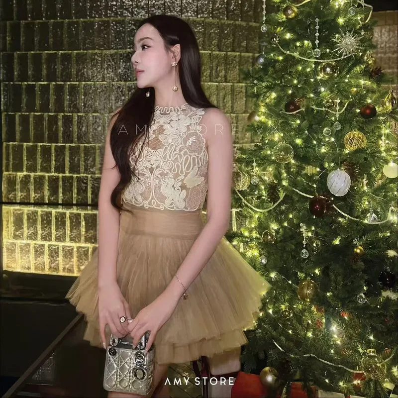 BEWQ فستان نسائي أنيق برقبة دائرية بدون أكمام مطرز شاش عالي الخصر فستان قصير للحفلات المسائية لخريف 2025 جديد