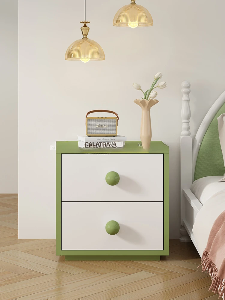 The new French cream wind bedside table is minimalist and simple. Modern bedside cabinet with small closet and bedroom bedside c