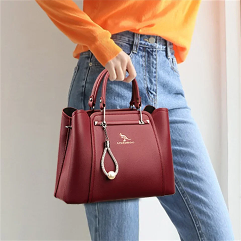 Classic Leather Handbag for Women Elegant Top Handle Bag Adjustable Shoulder Strap Luxury Pearl Pendant Stylish Versatile Tote