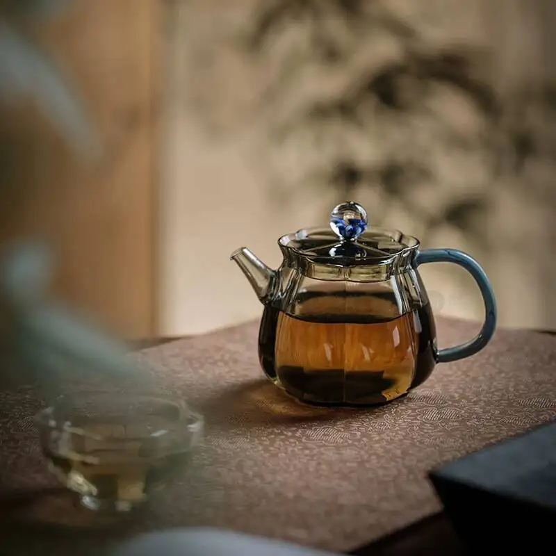 Wuyintang high End Thickened Heat Resistant Glass Mini Plum Blossom Teapot Kung Fu Set With Filter Tea Brewing Pot