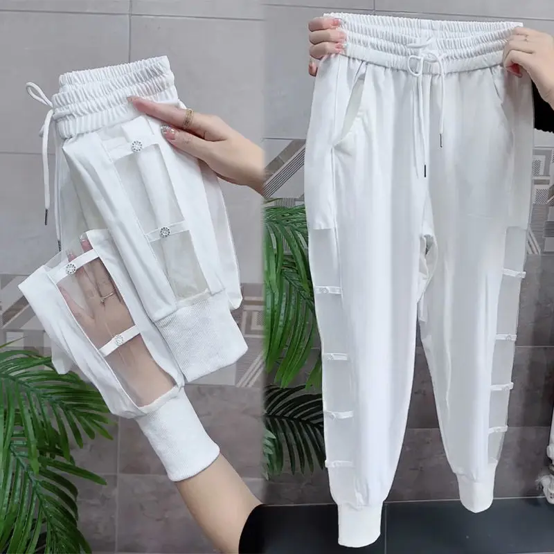 

Minimalist Commute 2026 Summer New Capris Women's Elastic Waist Solid Gauze Hollow Out Button Loose Straight Casual Pants