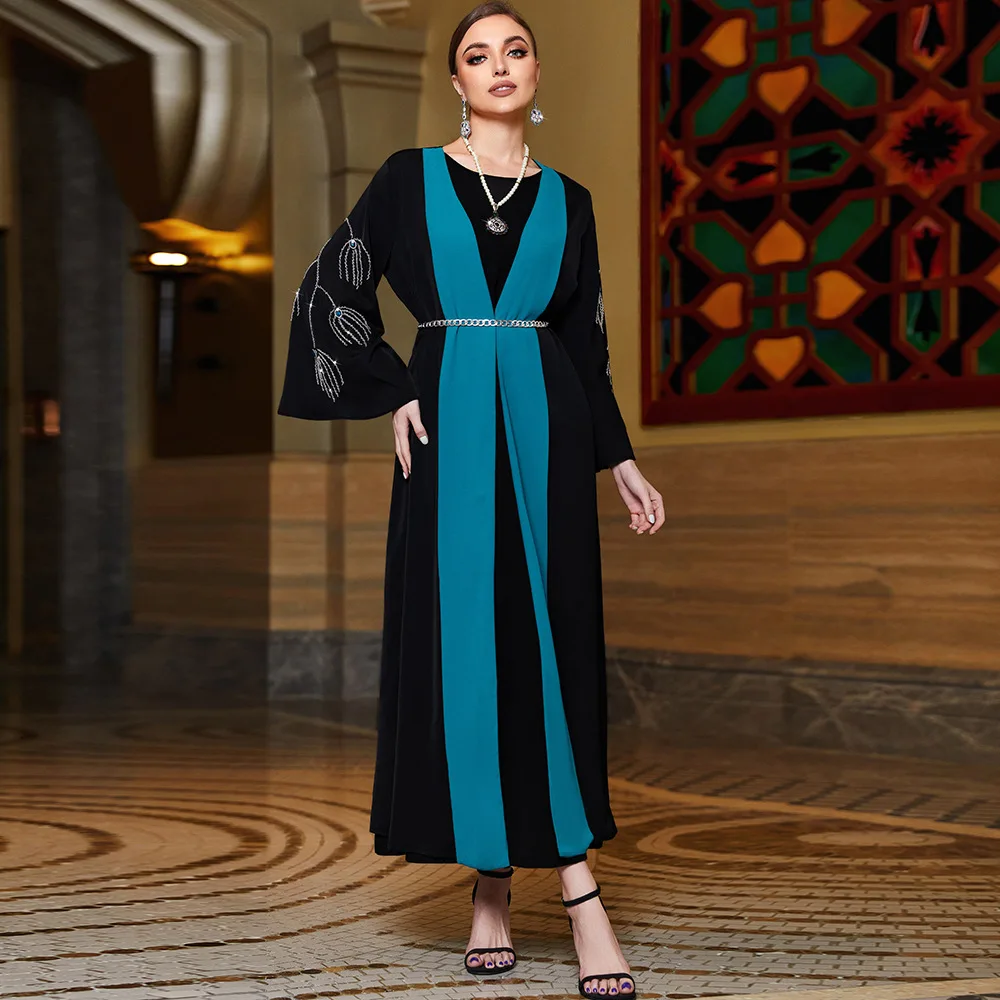 Black horn sleeves spliced with lake blue temperament, outer fit, Middle Eastern fashion temperament, slim and thin, elegant clo