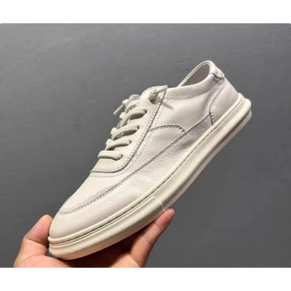 Handcrafted Off-White Leather Classic Sneaker – Superior Craftsmanship, Timeless Charm