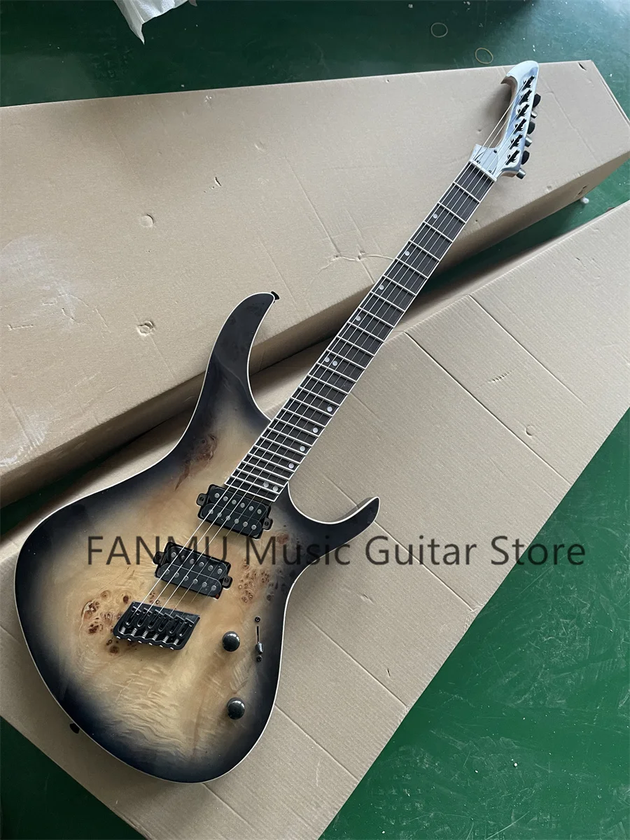 Transp black guitar, ash wood body, tree burl top, white binding, rosewood fingerboard, fixed bridge, black tuner