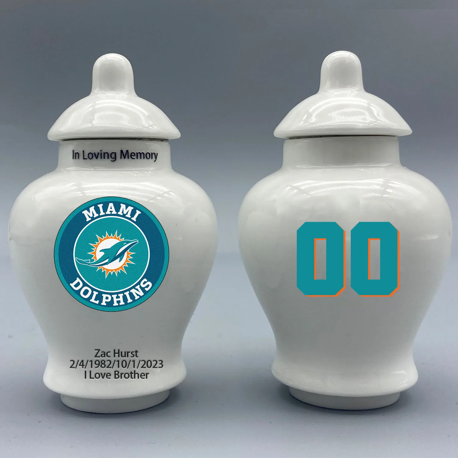 

Mini Urn for Miami Dolphins-themed Logo Urn.Please send me the customization information - name/date and number on the urn