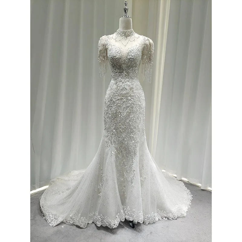 

A new luxurious and heavy-duty welcome dress made of fish-tail chiffon with lace as the main yarn knotted tail