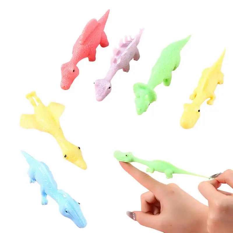 

Slingshot Dinosaur Finger Toys Dinosaur Shape Dino Figures Sling Shot Toys 6Pcs Sensory Fidget Toys Party Favors Funny Gag Gifts