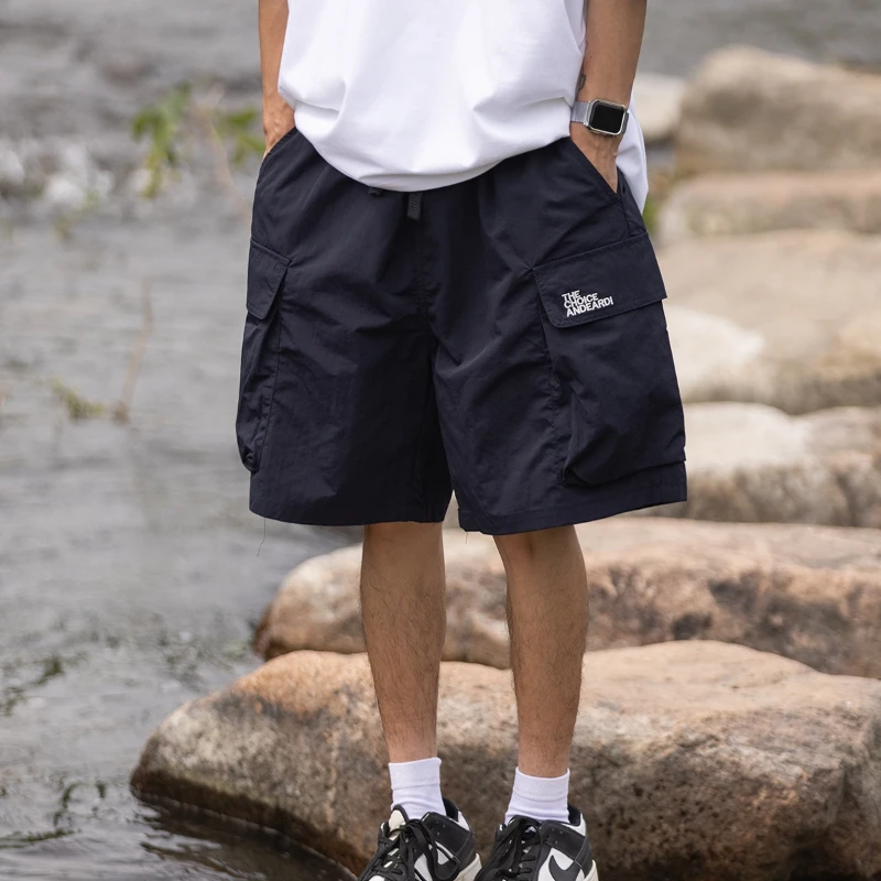 Celana pendek kargo pria, celana pendek kargo baru kantong elastis bordir pinggang sederhana Streetwear musim panas nyaman tali serut gaya Korea longgar Hip Hop