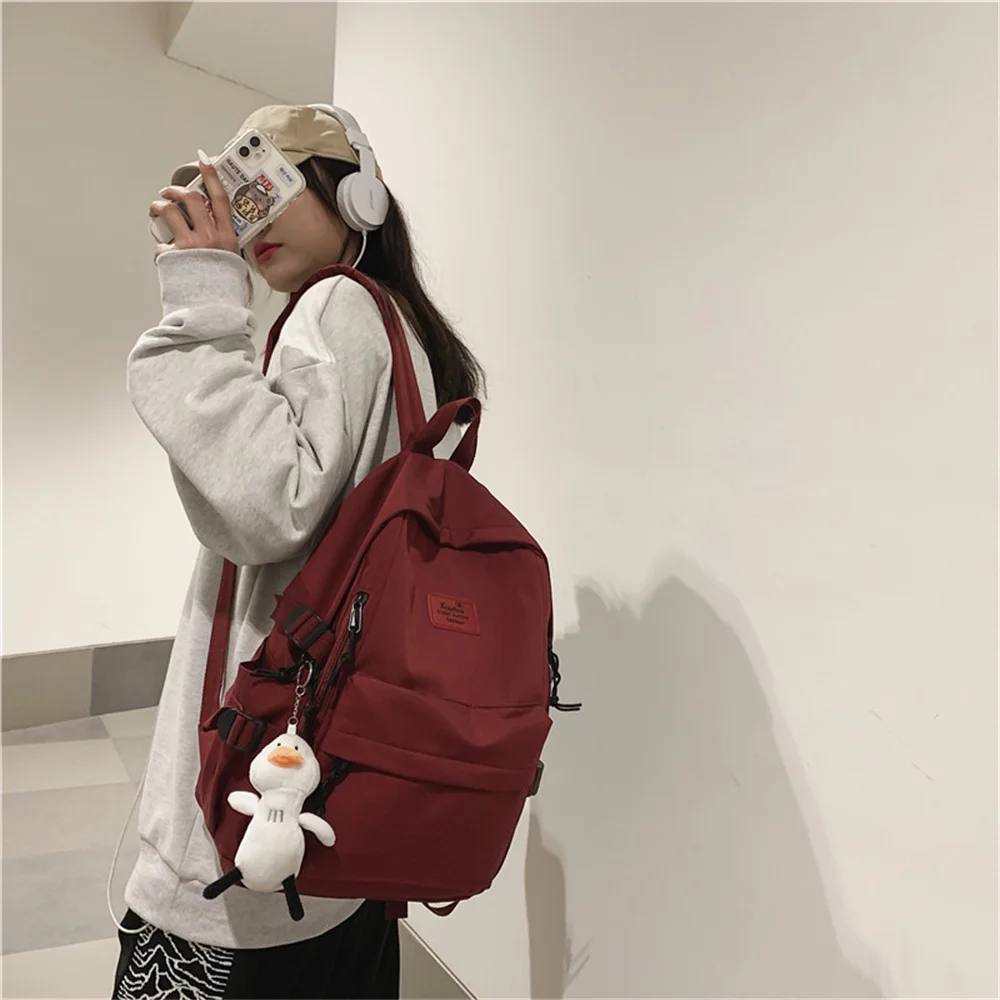 Mochila escolar informal de nailon de gran capacidad Unisex, mochila impermeable de Color sólido coreano para estudiantes de secundaria Harajuku Ulzzang