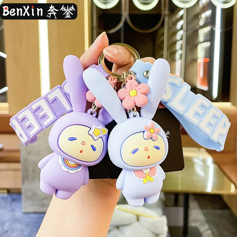 2025 Miniso Business personalisierte und exquisite kleine Geschenke, originale stressabbauende Schlüsselanhänger-Auto-Paar-Rucksäcke