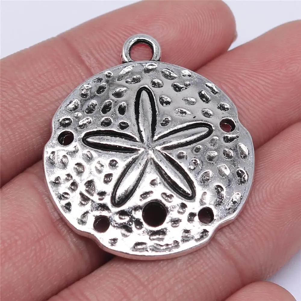 

Wholesale 50pcs/bag 35x30mm Sea Urchin Pendant Charms Wholesale Antique Silver Color Sand Dollar Pendants Charm