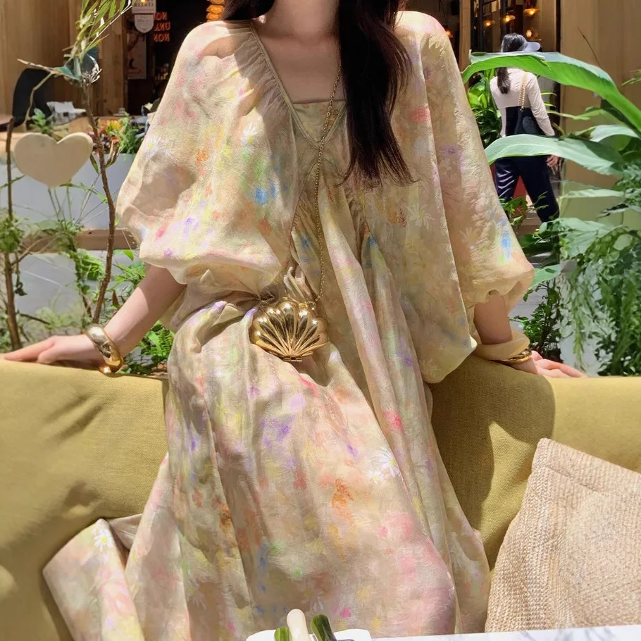 

2026 casual retro loose long V-neck bat sleeve niche French medium sleeve A word long dress women