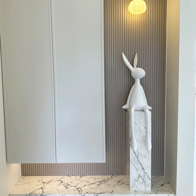 

Кролик орнамент гостиная диван ТВ шкаф рядом с прихожей модель комнаты сидячая поза подвесные ножки свет роскошь