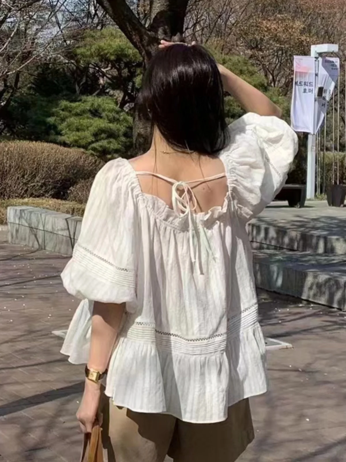 Elegancka bluzka damska w stylu vintage z ażurowym wzorem, bufiaste rękawy, wyszczuplająca, biała, luźna, w stylu koreańskim, z bufiastymi rękawami typu lampion.