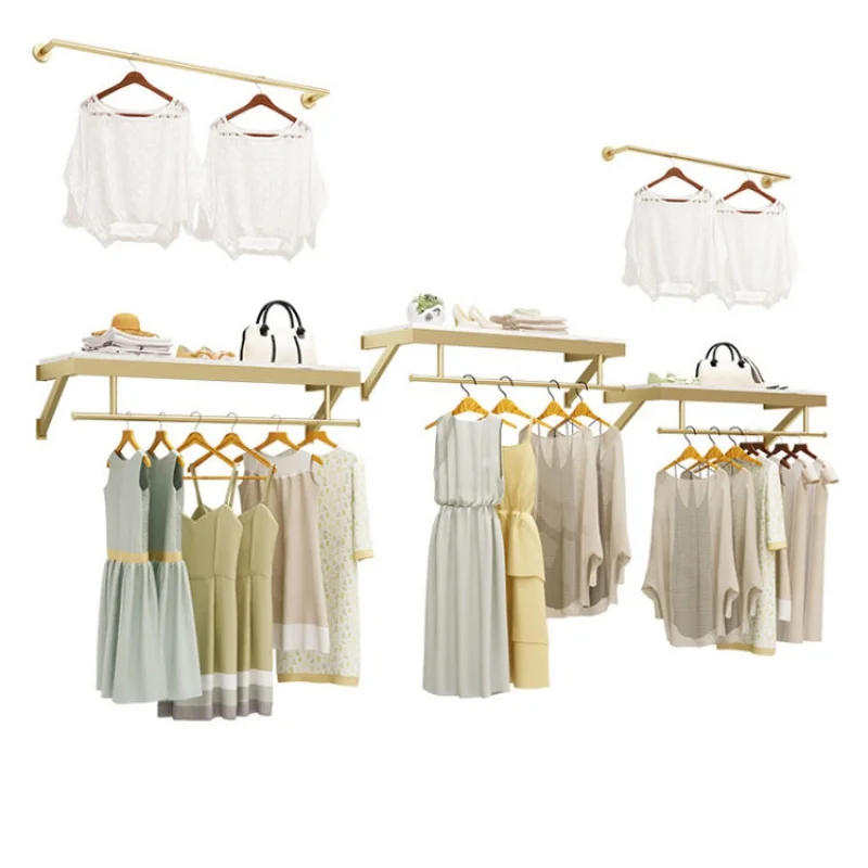 

custom，Retail Garment Store Gold Wall Mounted Elegant Clothing Hanger Rails Rack Shelf Systems Boutique Decor Ideas