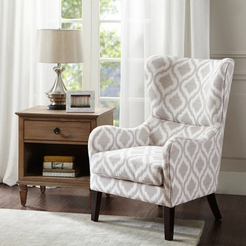 

Arianna Swoop Wing Chair Wing back Round arm Piping around edge Loose seat cushion Solid wood legs