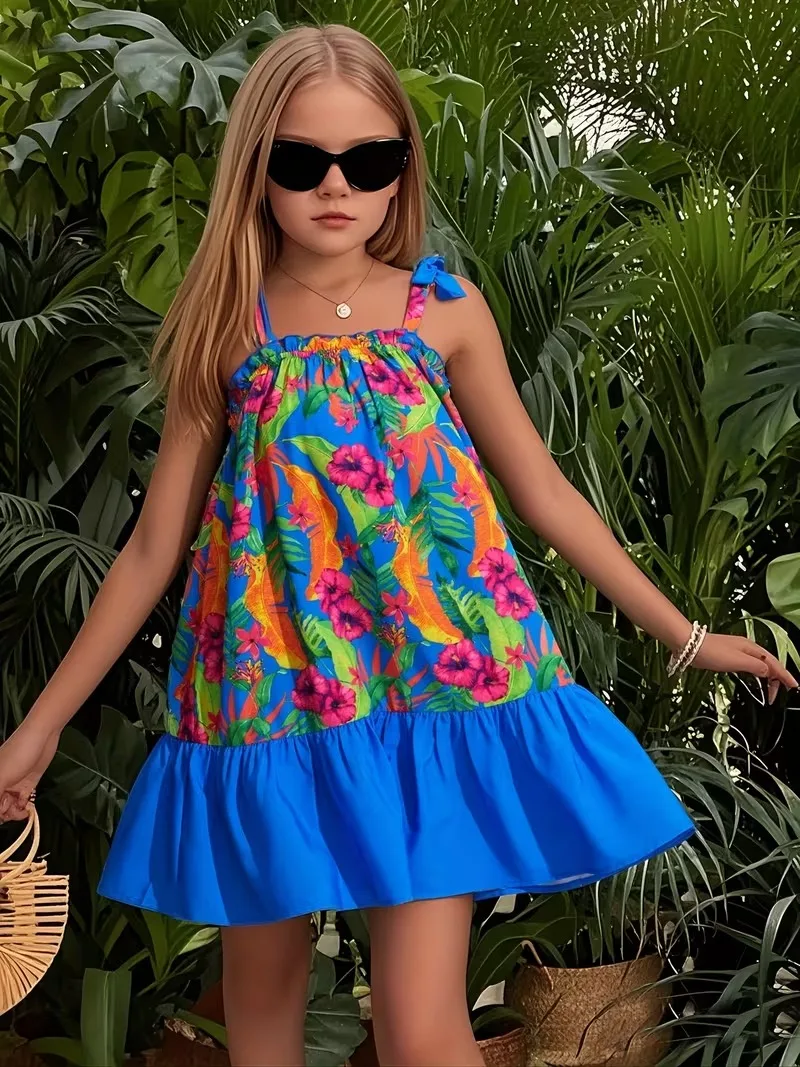 Trendiges Mädchenkleid mit Tropischen Blättern, Einteiliges Blaues Kleid mit Schleifenknoten-Trägern und Rüschensaum, Lässiges Strandkleid