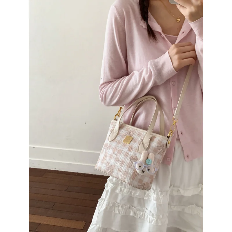 

Korean-style high-end niche bucket bag for women2026New trendy and cute versatile handbag and crossbody bag for girls commuting