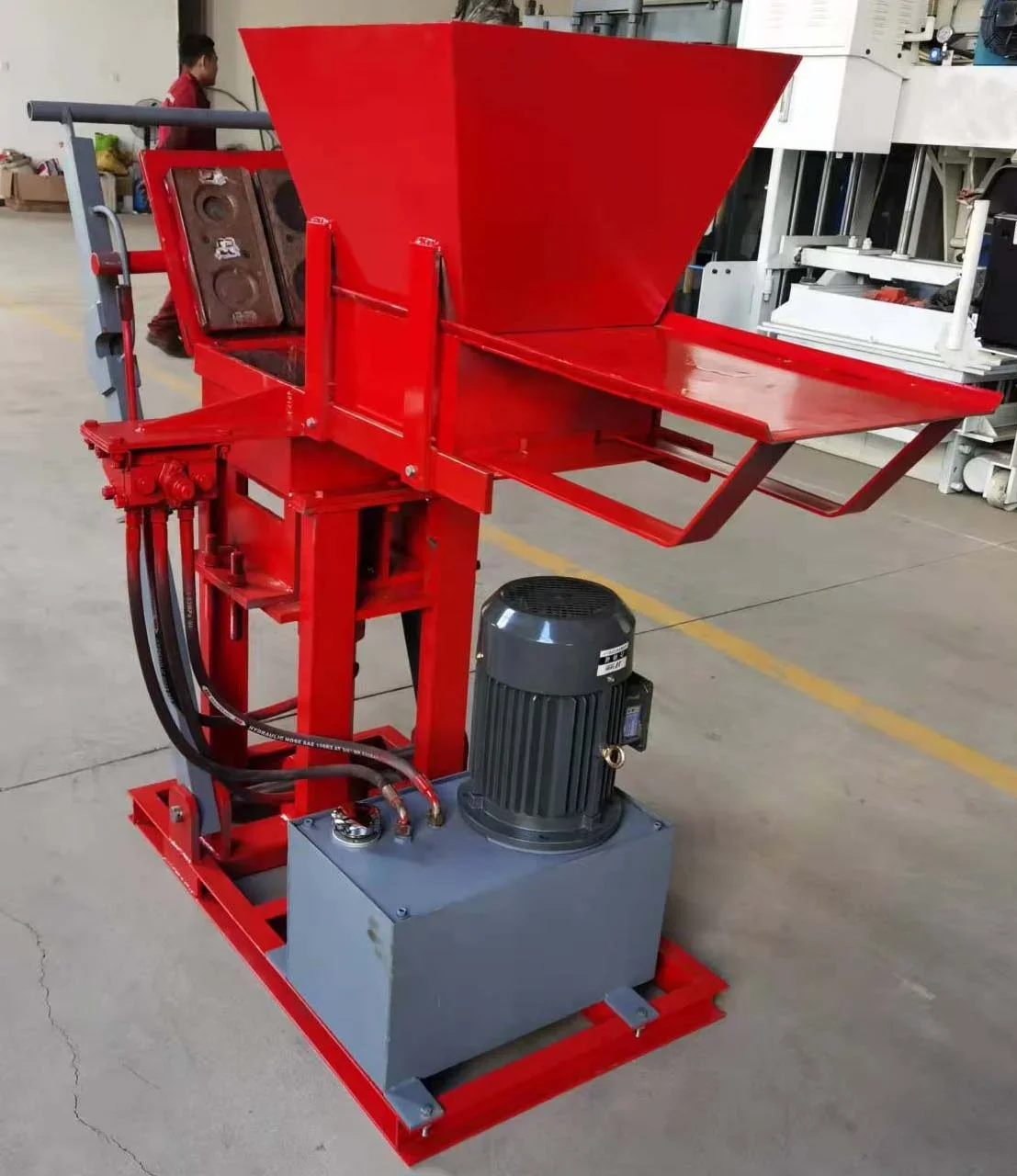 Electric interlocking brick making machine with higher efficiency and competitive price for construction machinery