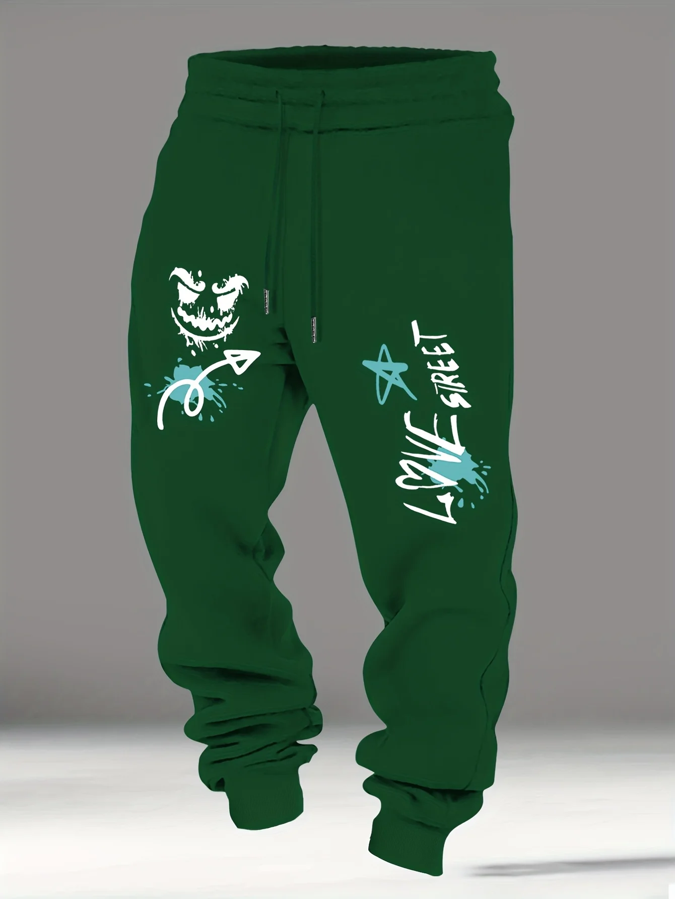 Splash‑ink street‑ghost face graffiti artwork stylish tapered fitted sweatpants men hip hop sports jogger trousers