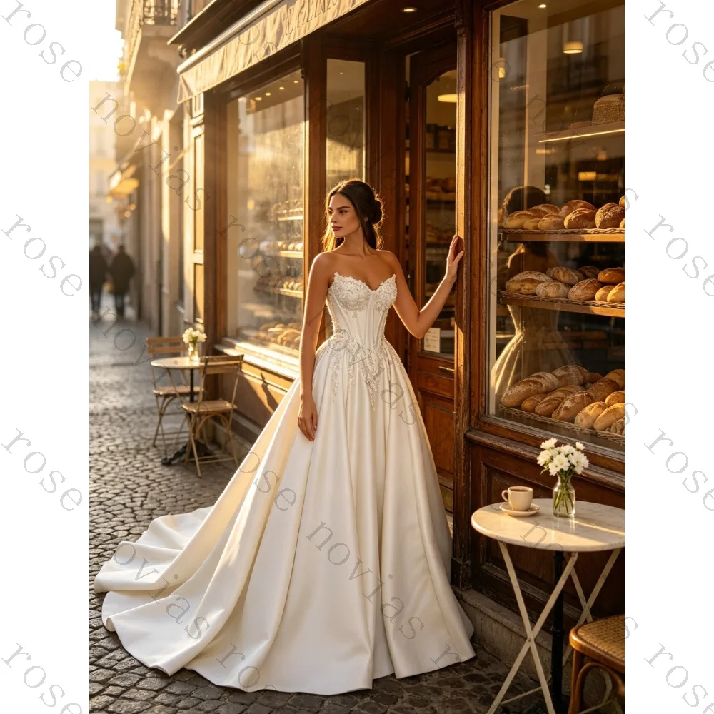 Customized Luxury Strapless Satin Pleated Wedding Dress 2026 Beaded Corset A-line Large Tail Bridal Gown Suitable for Beaches