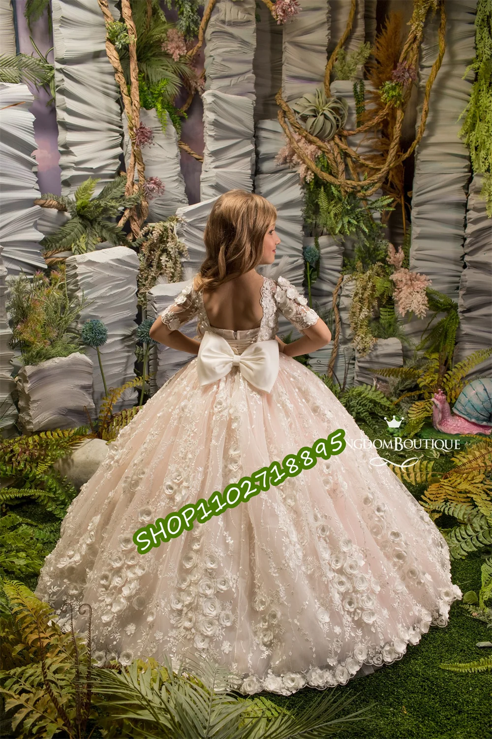 

Elbow Sleeve Flower Girl Dress Floor Length Tulle Gown with Ivory Lace Overlay Deep Neckline and Satin Bow Adorn Back