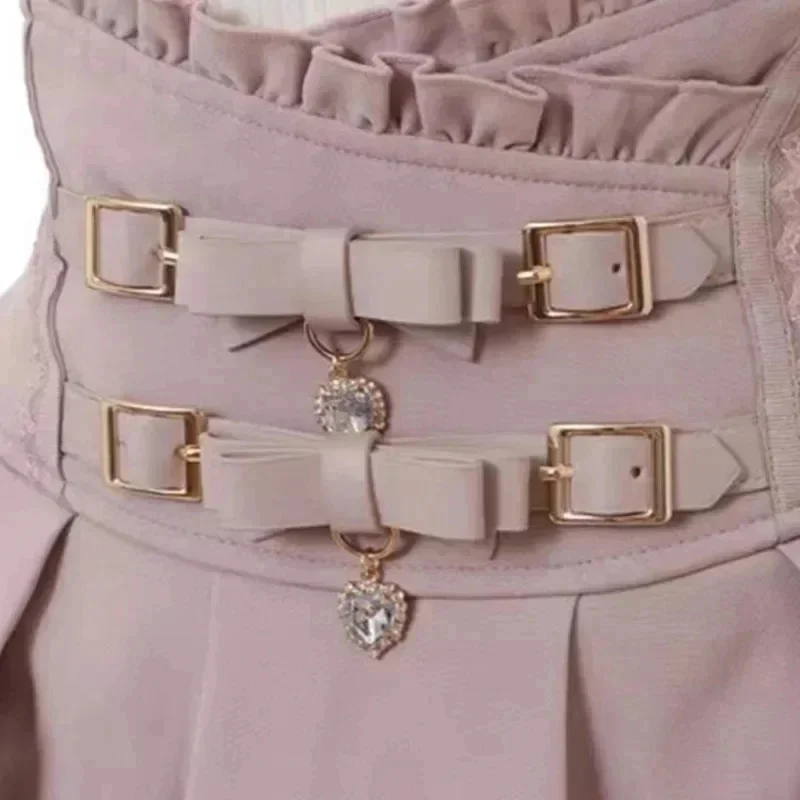 Minigonne a pieghe a vita alta in stile giapponese minigonne con Design a nodo a fiocco gonne a trapezio Kawaii Slim Fit gonne in pizzo rosa per le donne