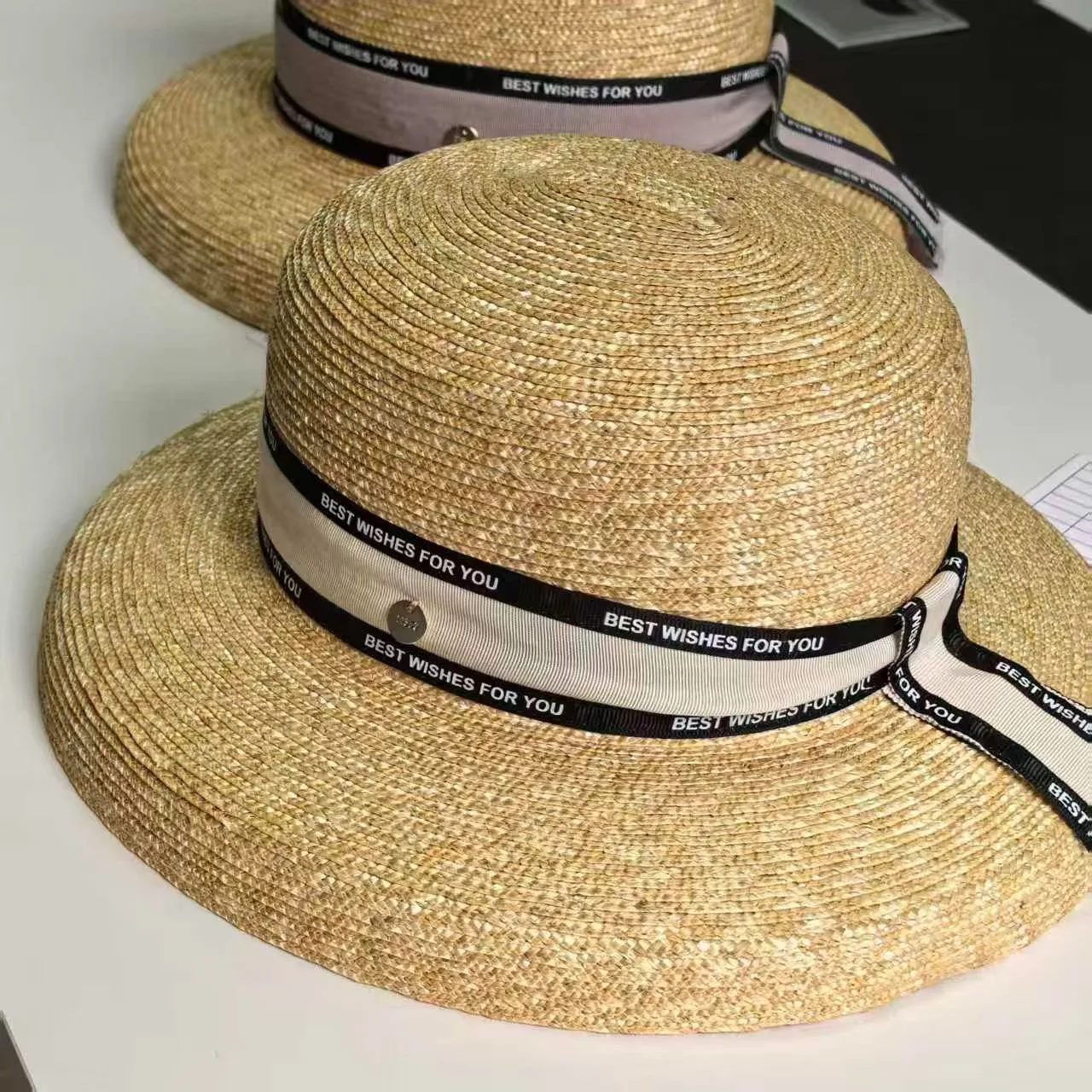 2026 New Hepburn Style Summer Straw Hat French Elegant Ladies Seaside Travel Sun Hat Bow Ribbon Flat Top Wide Brim Straw Hat