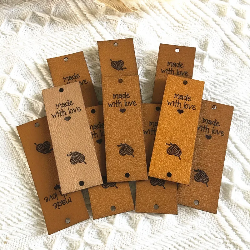 30pcs Handmade leather label for knitting Customize logo tags with rivets Sewing center fold labels for clothes hats Rectangle