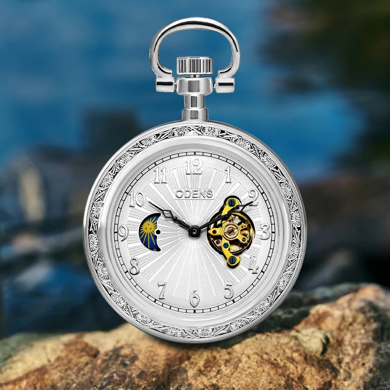 A sun, moon and stars mechanical watch with a beautiful pattern on the back cover Equipped with a thickened chain This mechanica
