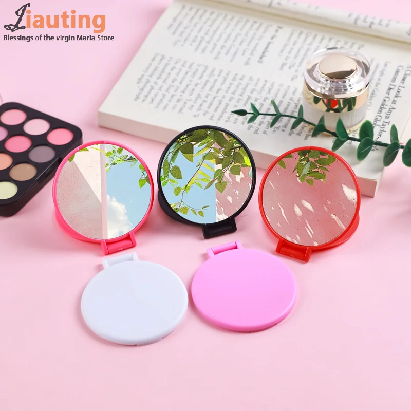 กระจกแต่งหน้า HD แนวตั้งทรงกลมแบบพกพาพับได้กระจกตั้งโต๊ะแบบใช้คู่แนวตั้งราคาไม่แพงนักเรียนจับกระจกแต่งหน้า