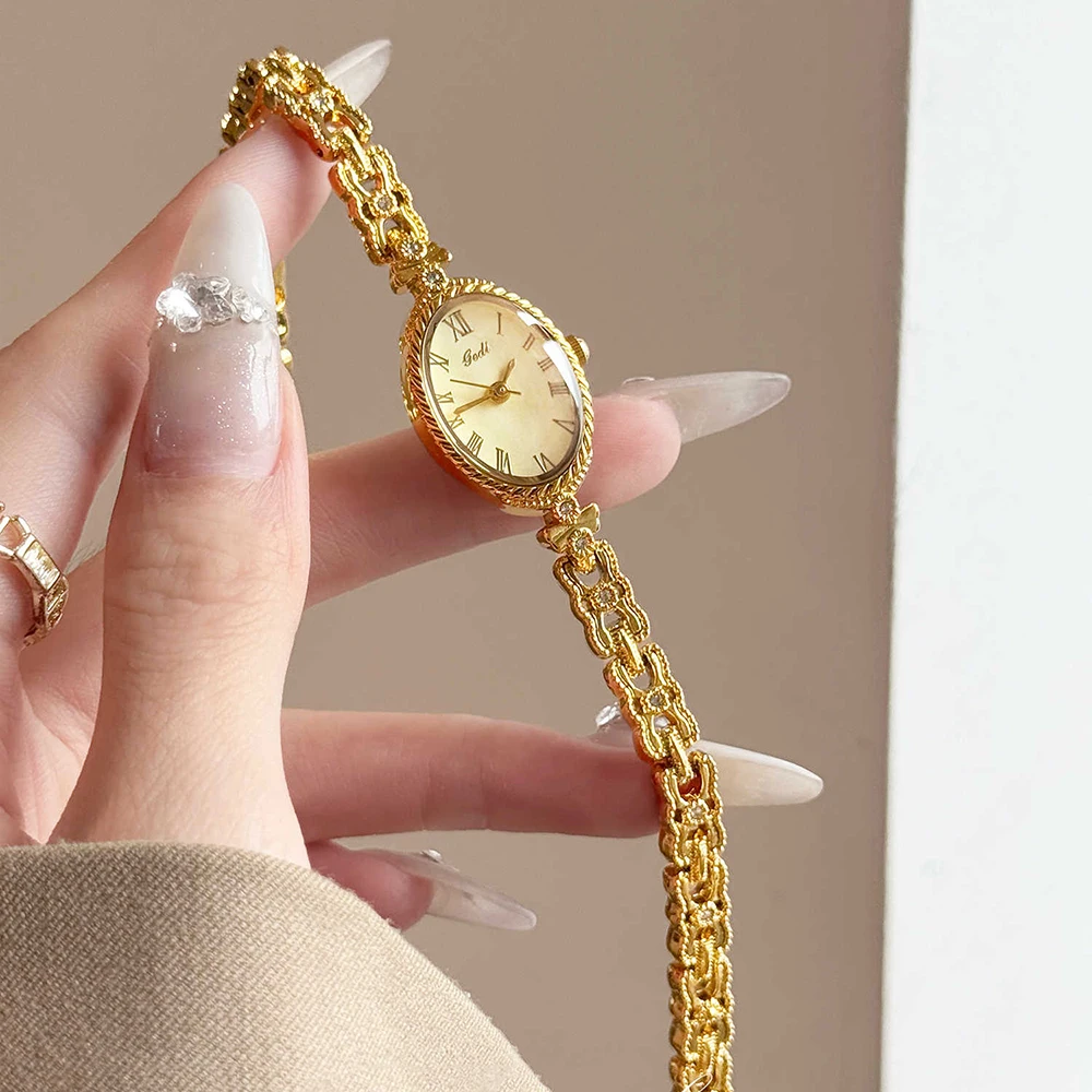 

Золотые часы GEDI, элегантные наручные часы 2026, овальный циферблат, изысканные кварцевые модные часы для женщин, роскошные часы в стиле ретро с золотым браслетом