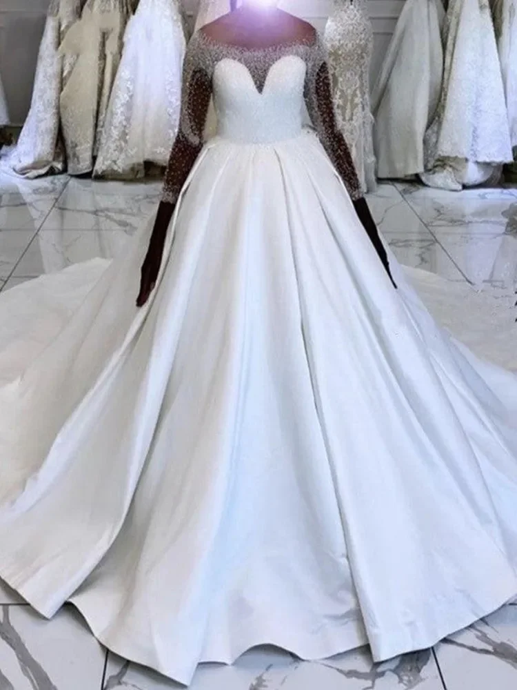 Customized Shinny Full Beads Sequins African A-Line Wedding Dresses Illusion Long Sleeves Satin Church Bridal Dress