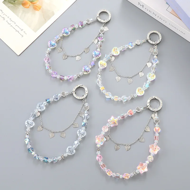 Nouvelle breloque créative pour téléphone en forme de cœur à double chaîne avec pendentif porte-clés polyvalent en perles étoiles colorées.