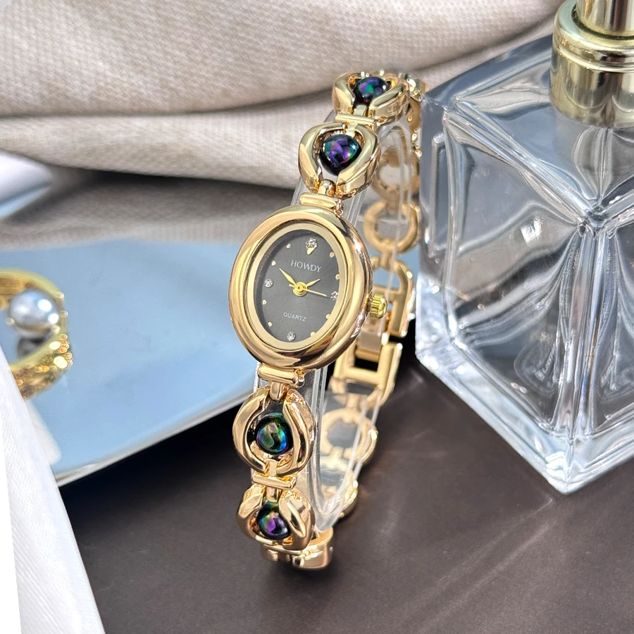 

Ladies' Silky Texture Oval Alloy Case Set with Movable Fine Bead Bracelet Sun Print Rhinestone Dial Elegant Lady Quartz Watch