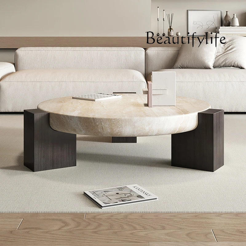 

Cream wind tunnel stone coffee table round high-end living room home creative marble medium ancient solid wood