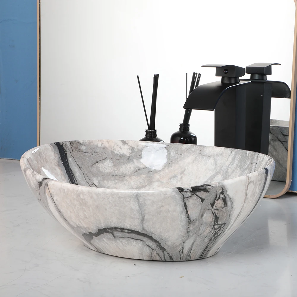 Torayvino Marble Pattern Ceramic Vessel Sink Set Oval Bathroom Wash Basin w/ Black Waterfall Faucet & Drain Set for Home Hotel