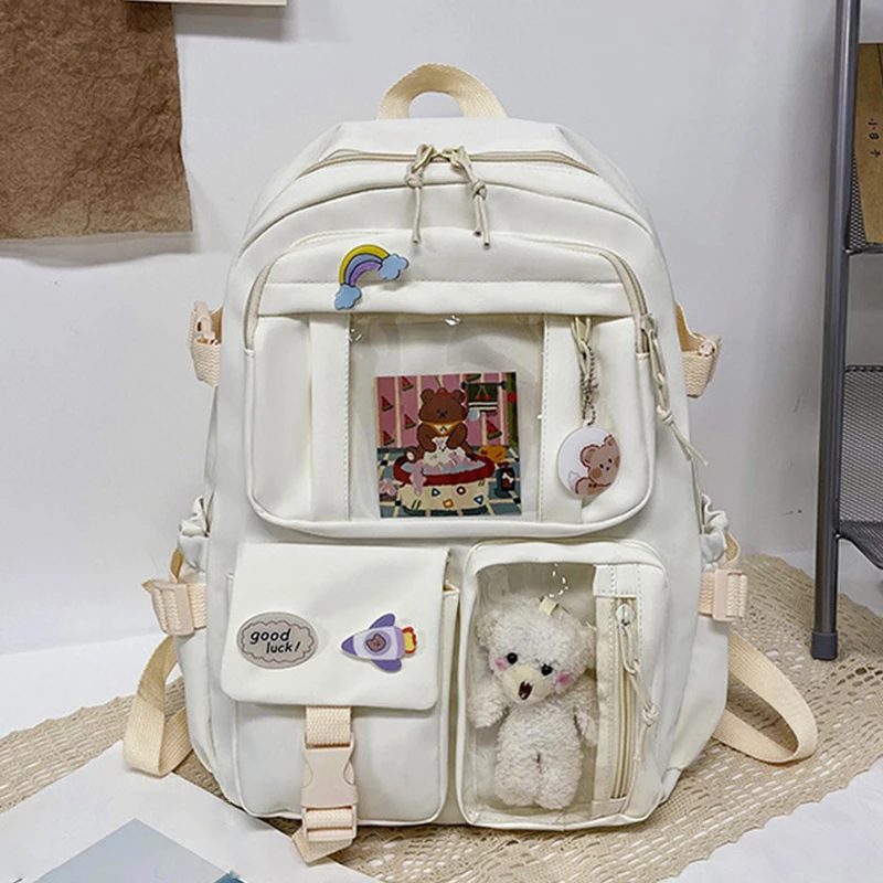 Sac à dos en nylon pour étudiants, sac d'école Preppy, sac de voyage mignon pour fille, pendentif badge