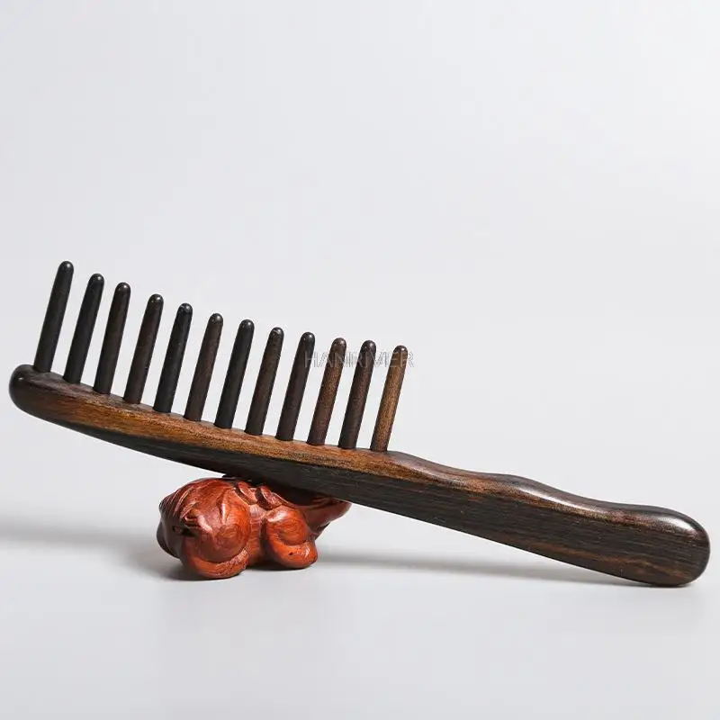 Horn sandalwood comb Shen Guibao tooth shaper massage comb goes deep into the scalp to clean up dandruff and pass the comb