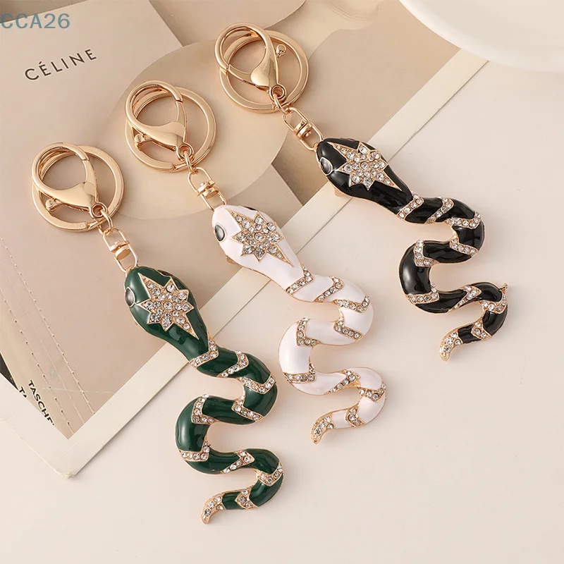 1Pcs New Creative Chinese Zodiac Snake Enamel Inlaid Diamond Car Keychain Car Pendant Bag Hanging Decoration Small Party Gift