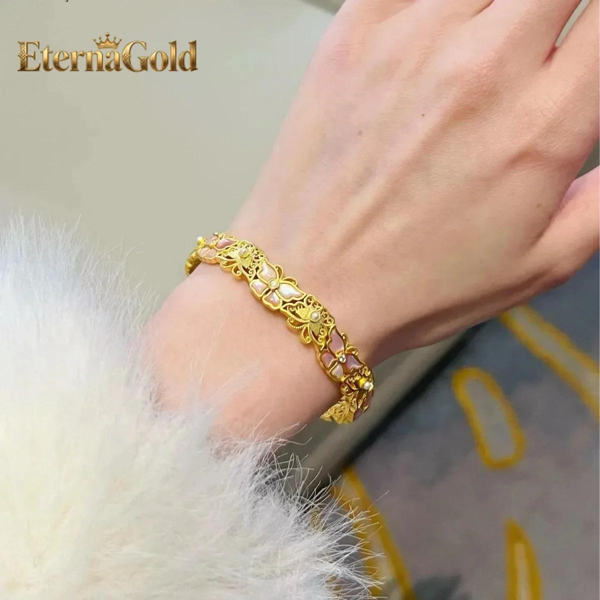 

EternaGold Women's 24K Gold AU999 Pink Floral Butterfly Bracelet | Ancient-chiseled butterfly on pink crystal flowers, romantic