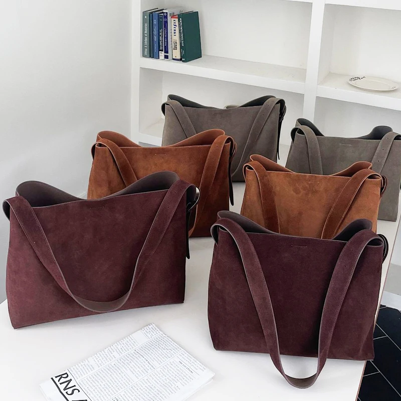 Bolsas de couro genuíno coreanas para mulheres bolsas e bolsas de grife de luxo 2024 novas em couro de vaca de grande capacidade com bolso interno bolsa de ombro nas axilas alta qualidade Frete grátis Envio rápido cheg