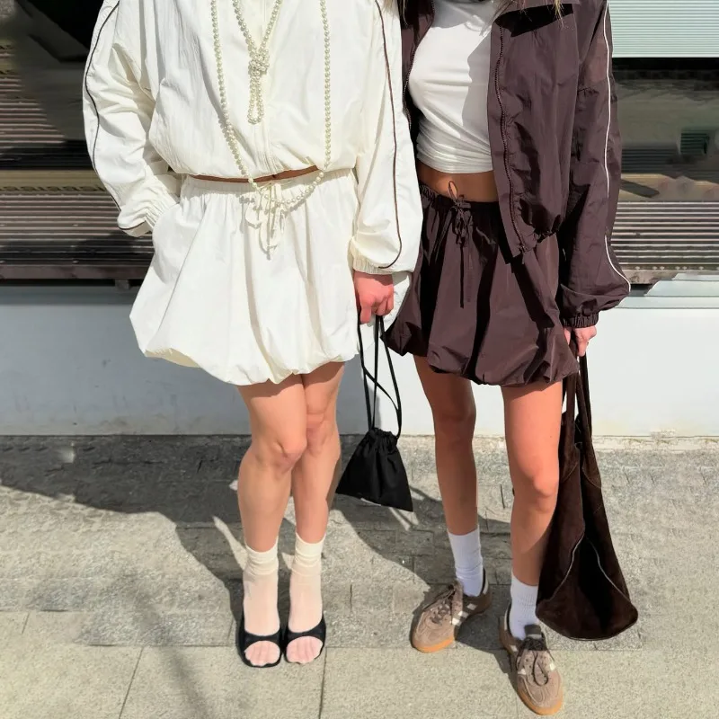 Quick-drying sports suit turtleneck long-sleeved contrasting coat drawstring bud short skirt two-piece women's clothing