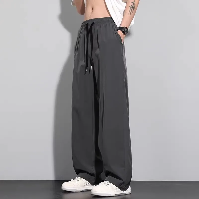Pantaloni casual sportivi sottili estivi da uomo in seta di ghiaccio Pantaloni lunghi larghi alla moda a gamba larga Qui Dry per il tempo libero giovanile Faion