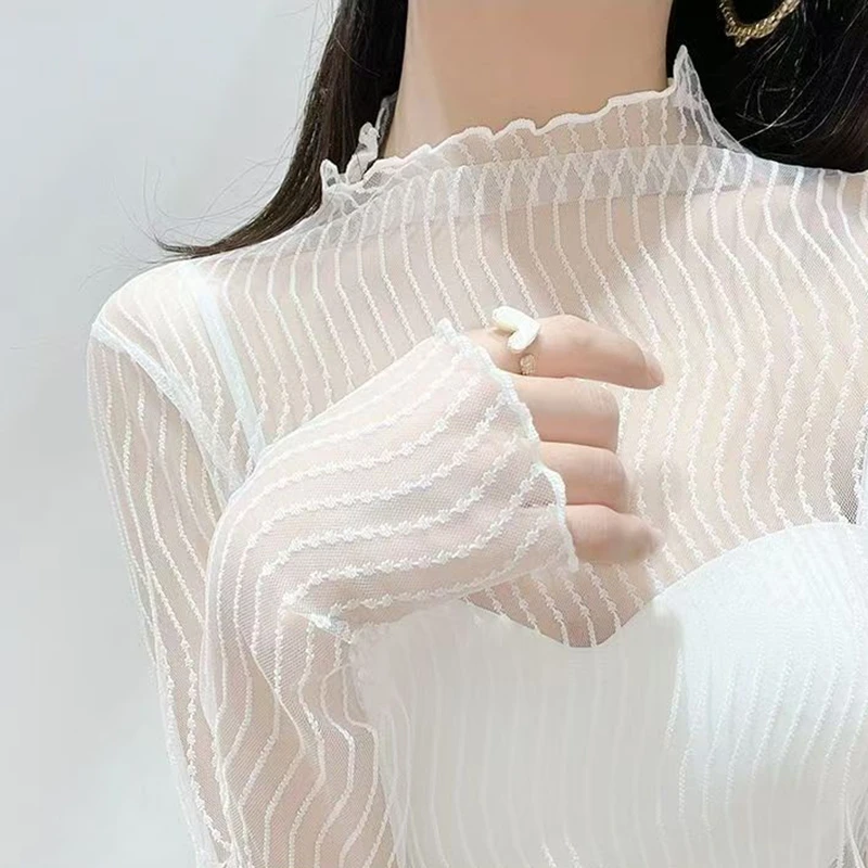 Malha sólida ver através de blusas femininas protetor solar roupas sexy oco manga longa gola alta transparente topo branco camisa de festa