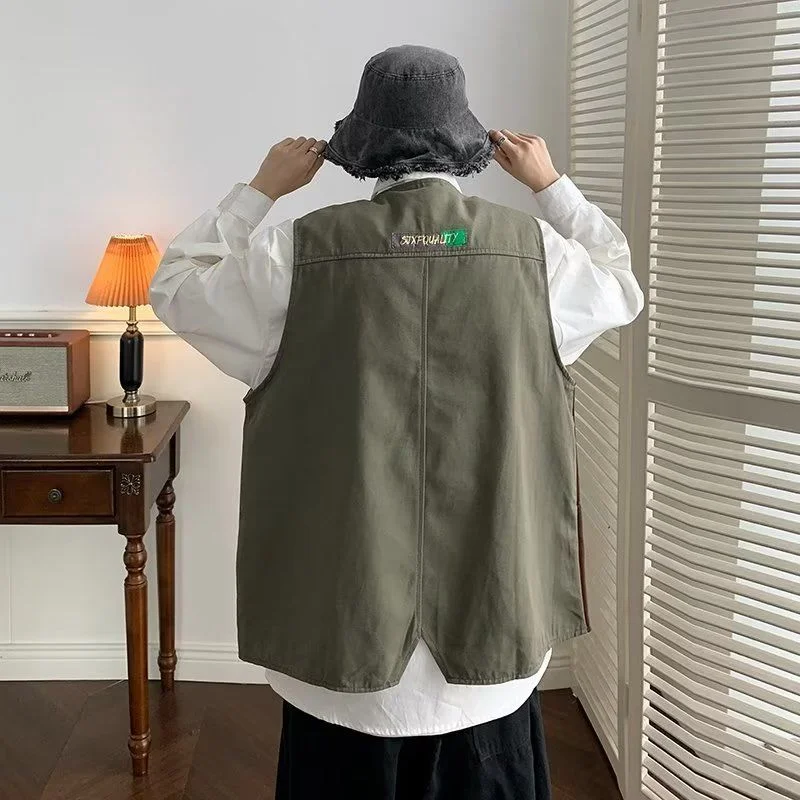 เสื้อกั๊กทำงานสไตล์ฮ่องกงย้อนยุค ตัดสีสันสวยงาม ทันสมัย ใช้ได้หลากหลาย เหมาะสำหรับผู้ชายและผู้หญิง แบบหลวมๆ ไม่มีแขน